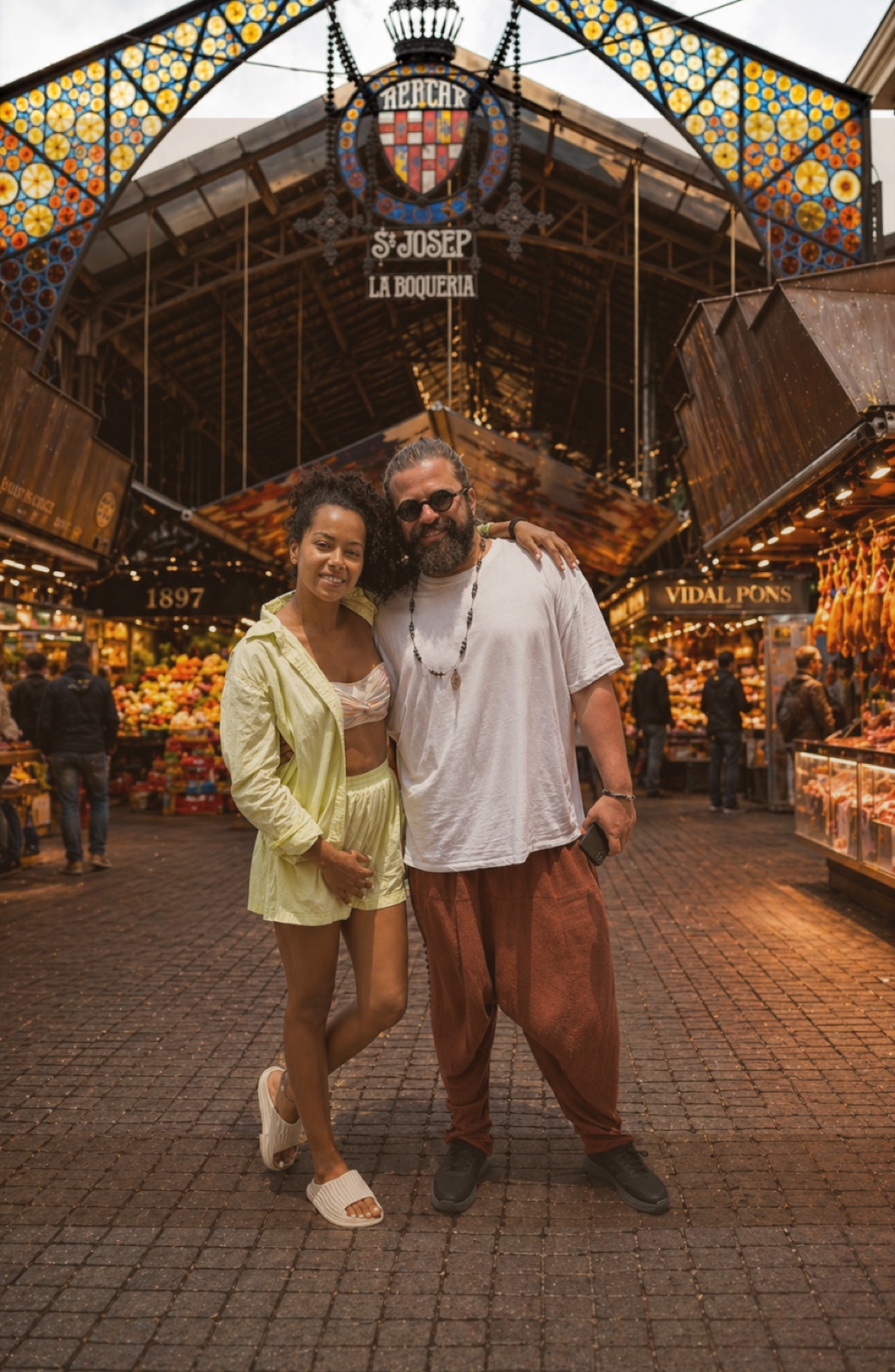 Jessica and her partner at La Boqueria, Barcelona — Spain Food Guide mission