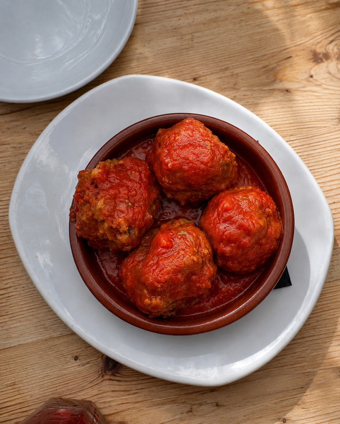 Albóndigas in tomato sauce at El Rincón de Pepe, a traditional Spanish tapas restaurant in Santa Eulària, Ibiza.