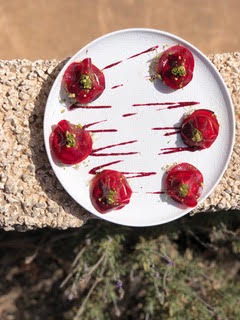 Beetroot ravioli with cashew cheese and pesto at Wild Beets in Santa Gertrudis.